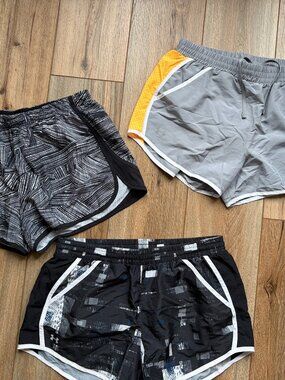 Bundle of 3 ladies running shorts Under Armour Heatgear size medium gray black